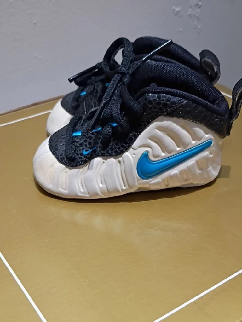 Nike Black and White Baby Walker Sneakers with Blue and Red Accents